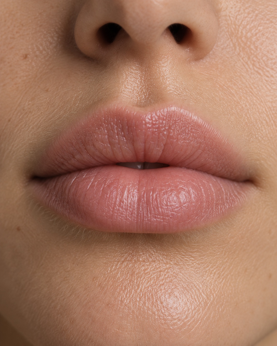 Close macro of a relaxed mouth before treatment, lips unpainted